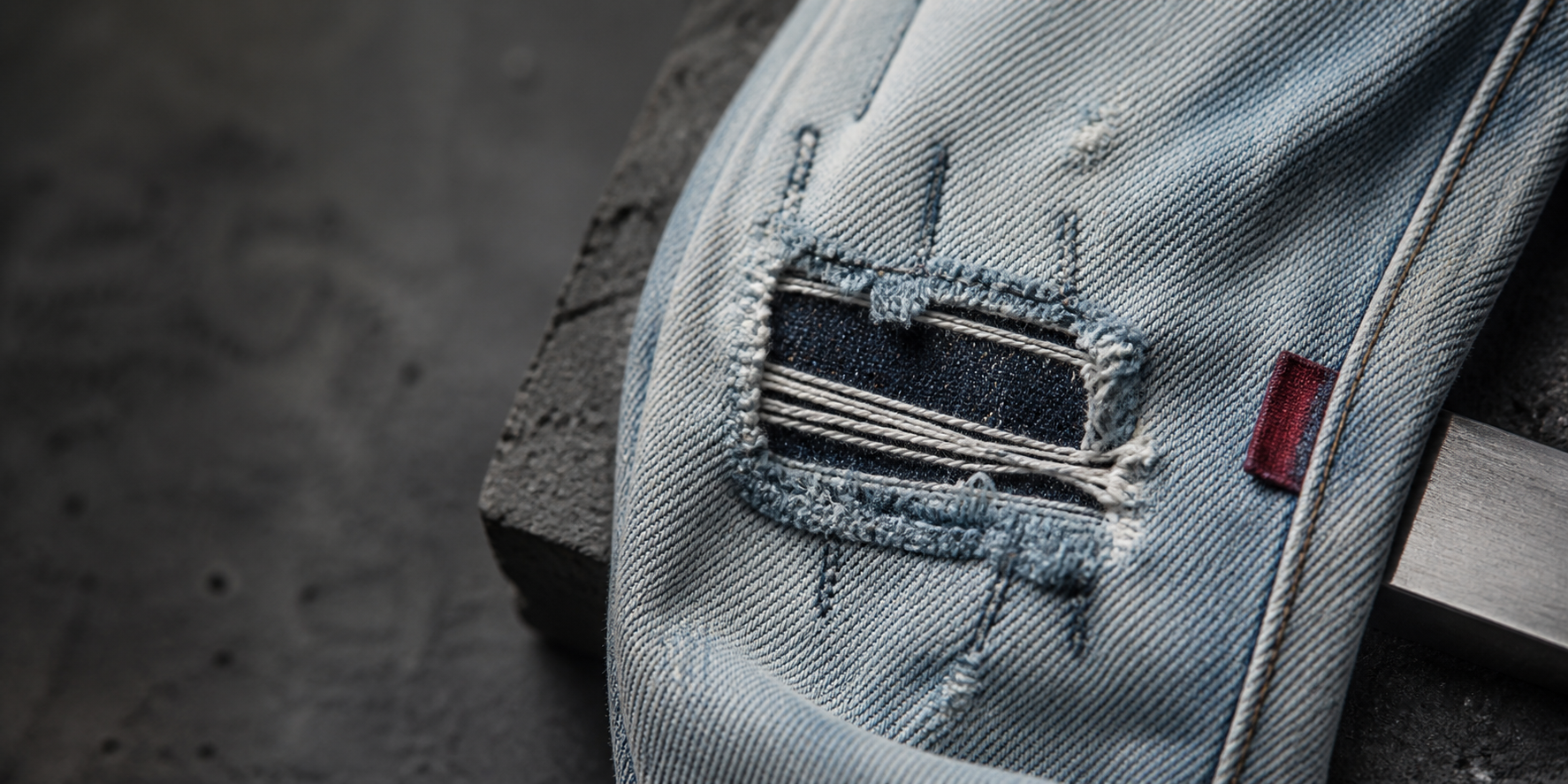 Close detail of reconstructed denim craftsmanship